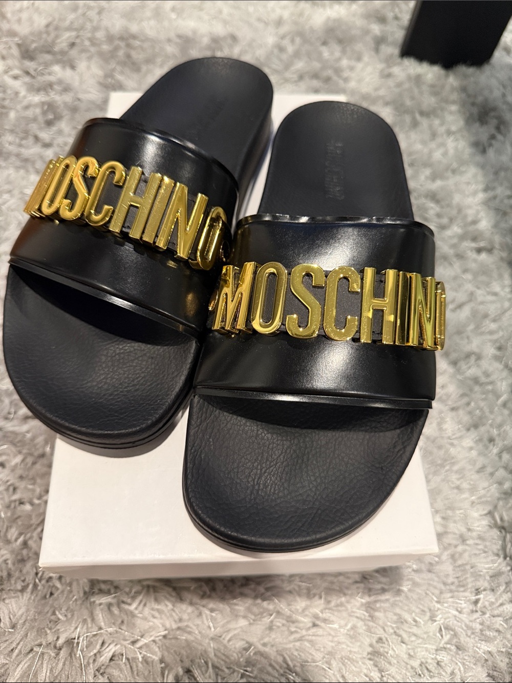 Moschino Black Slides with Gold Logo Plaque